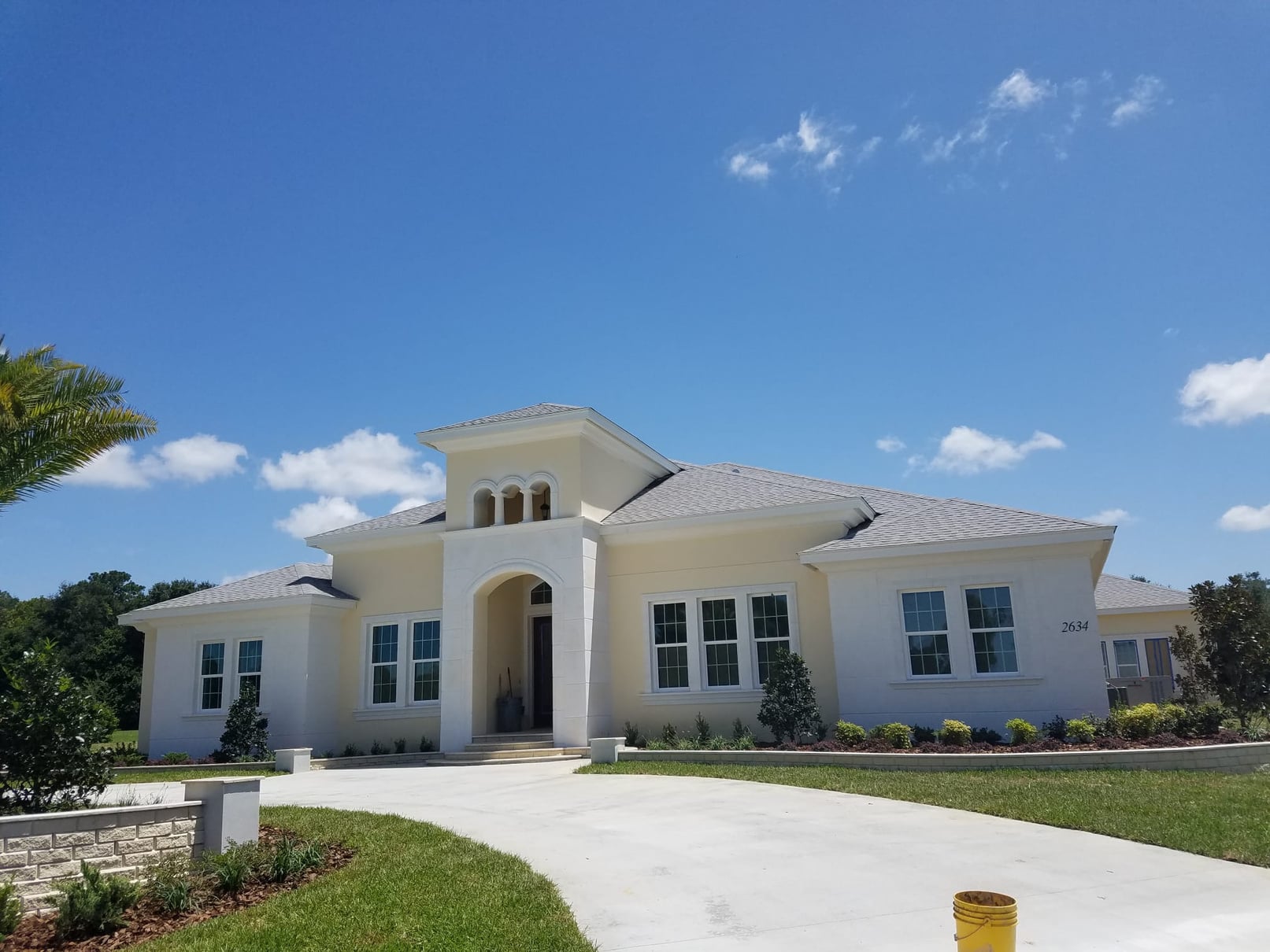 Custom home exterior with architectural foam entry columns by Foam Concepts