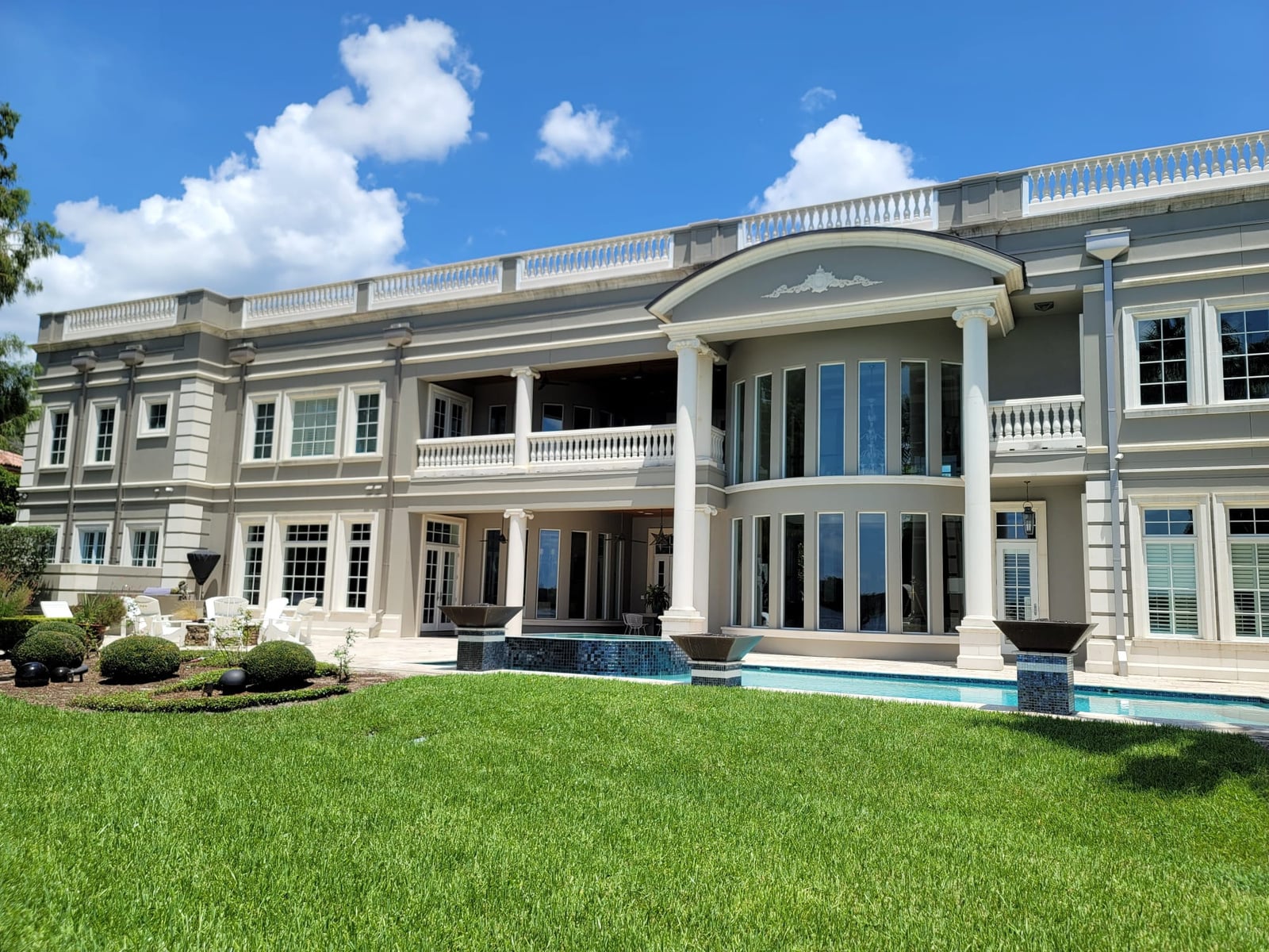 Large estate home with architectural foam exterior columns and balustrades