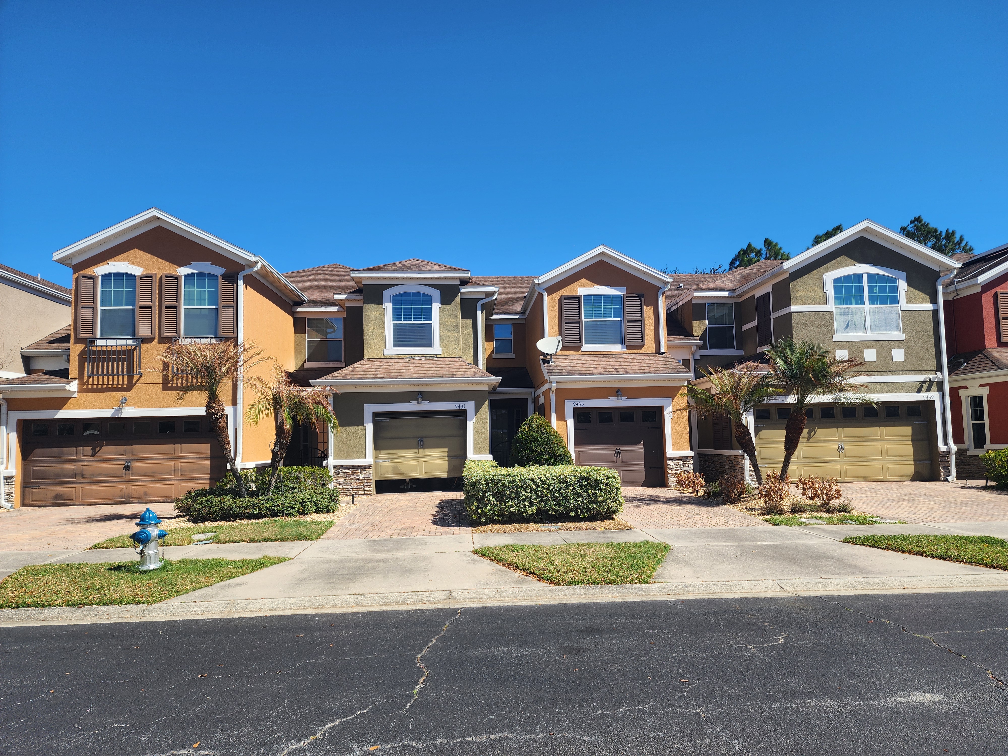 Townhomes with foam window trims and decorative shutters