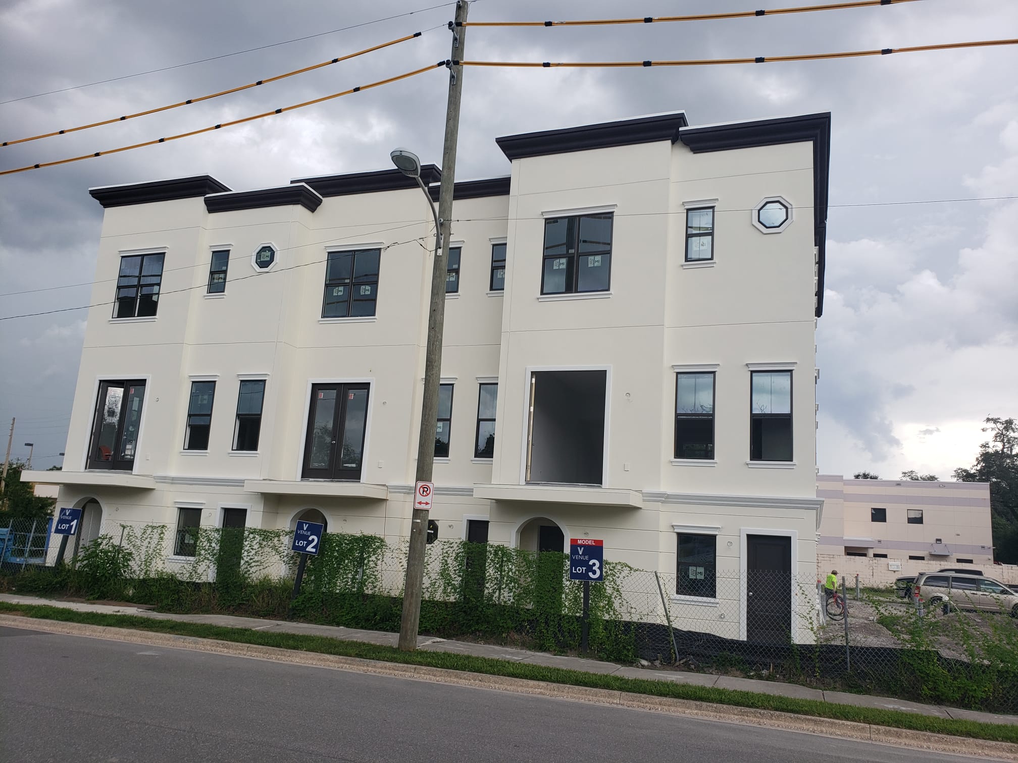 Multi-family building with architectural foam crown molding and window details